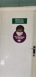 No Face Mask No Entry sign on door