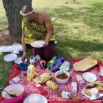 Man at picnic in traditional attire