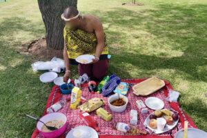 Man at picnic in traditional attire