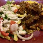 Beef curry, rice and salad