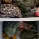 Frige with vegetables and fish