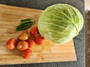Cabbage, tomatoes and green chillies