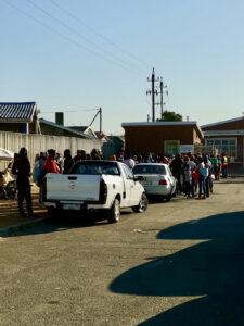 People lining up outside clinic